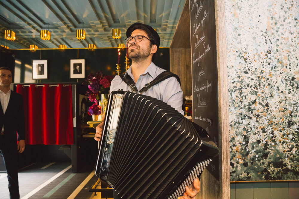 Wedding musician playing accordeon at wedding reception
