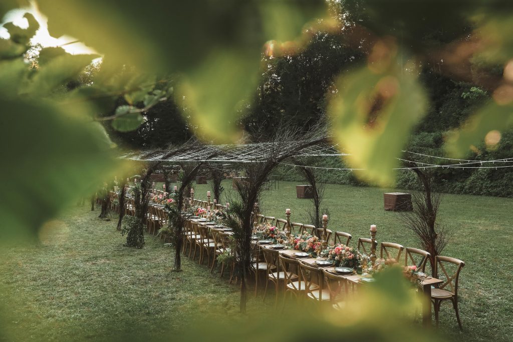 wedding in a grand table with flowers