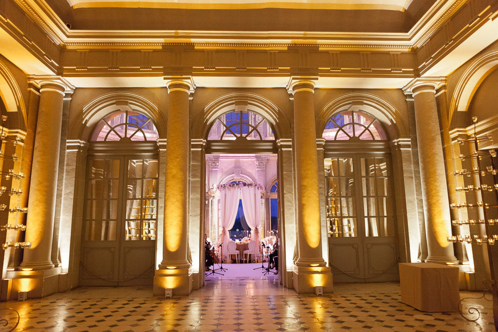Dinner setup and lights for wedding in a French chateau